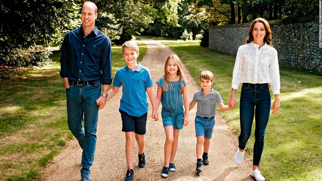 Britain&#39;s Prince William and his wife, Catherine, walk with their three children -- from left, George, Charlotte and Louis -- in Norfolk, England. The photo was featured on the family Christmas card in December 2022.