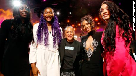 South Carolina head coach Dawn Staley (middle) saw five of her players drafted.