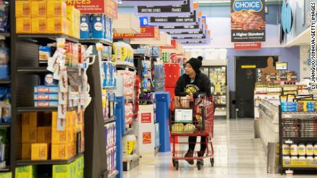 A customer shops at a supermarket in Millbrae, California, the United States, March 14, 2023.