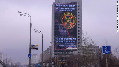 An advertising screen, which promotes to join Wagner private mercenary group, is on display on the facade of a building in Moscow, Russia, March 27, 2023. A slogan on the screen reads: &quot;Join the team of victors!&quot;  REUTERS/Evgenia Novozhenina