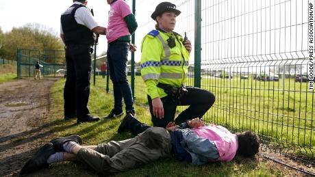 Debate rages on in UK after more than 100 people arrested over Grand National protests