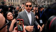 NEW YORK, NEW YORK - APRIL 04: U.S. Rep. George Santos (R-NY) walks through the crowd gathered outside the courthouse where former U.S. President Donald Trump will arrive later in the day for his arraignment on April 4, 2023 in New York City. With his indictment, Trump will become the first former U.S. president in history to be charged with a criminal offense. (Photo by Drew Angerer/Getty Images)