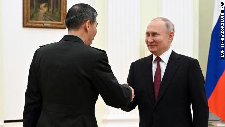 US-sanctioned Chinese defense minister meets Putin in Moscow, hails military ties