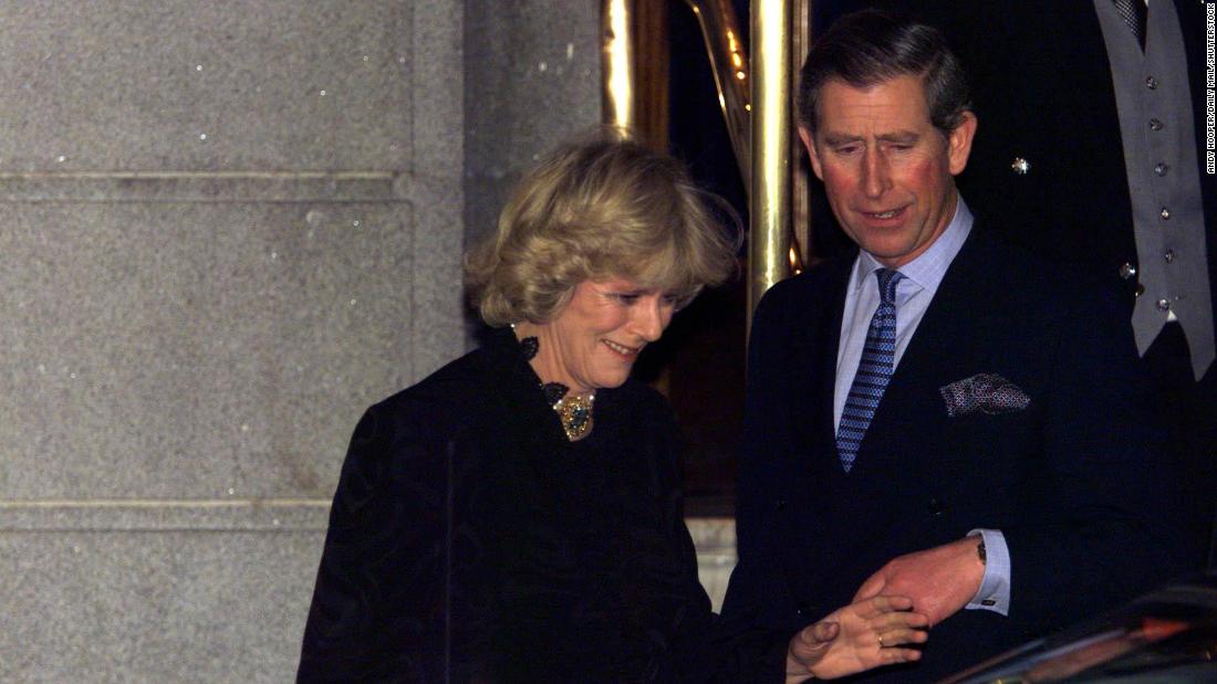 Charles and Camilla make their first public appearance as a couple after leaving a party in London in 1999.