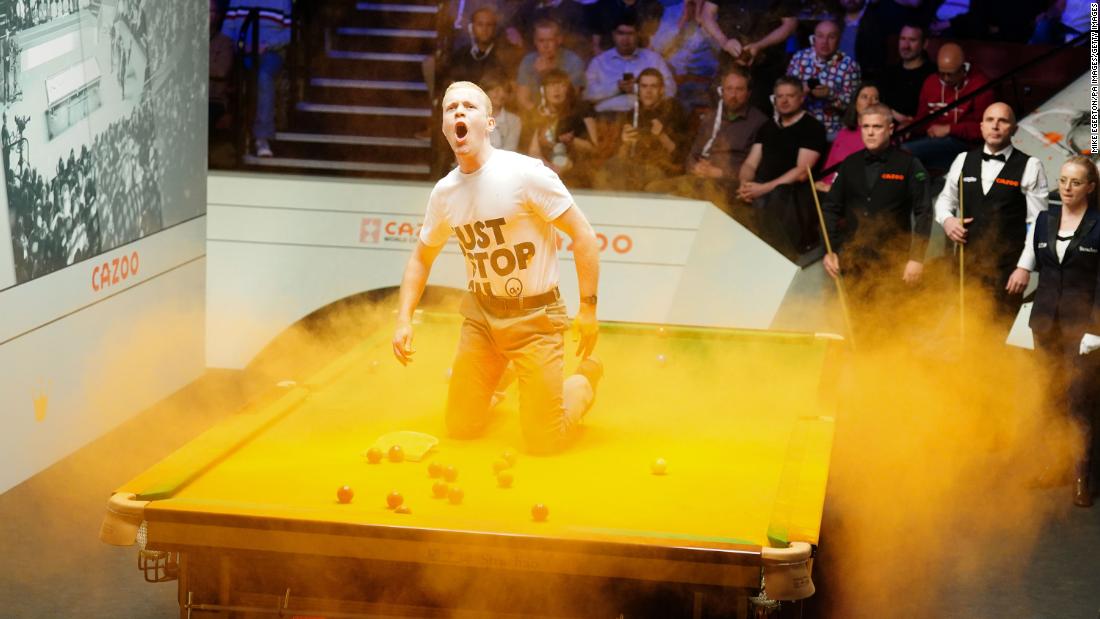 Just Stop Oil protester disrupts World Snooker Championship