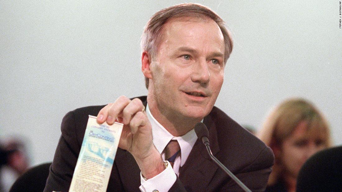 Hutchinson, as head of the Drug Enforcement Administration, shows a pen with a pullout OxyContin advertisement while testifying on Capitol Hill in 2001. Hutchinson resigned from Congress in 2001 to serve as DEA administrator.
