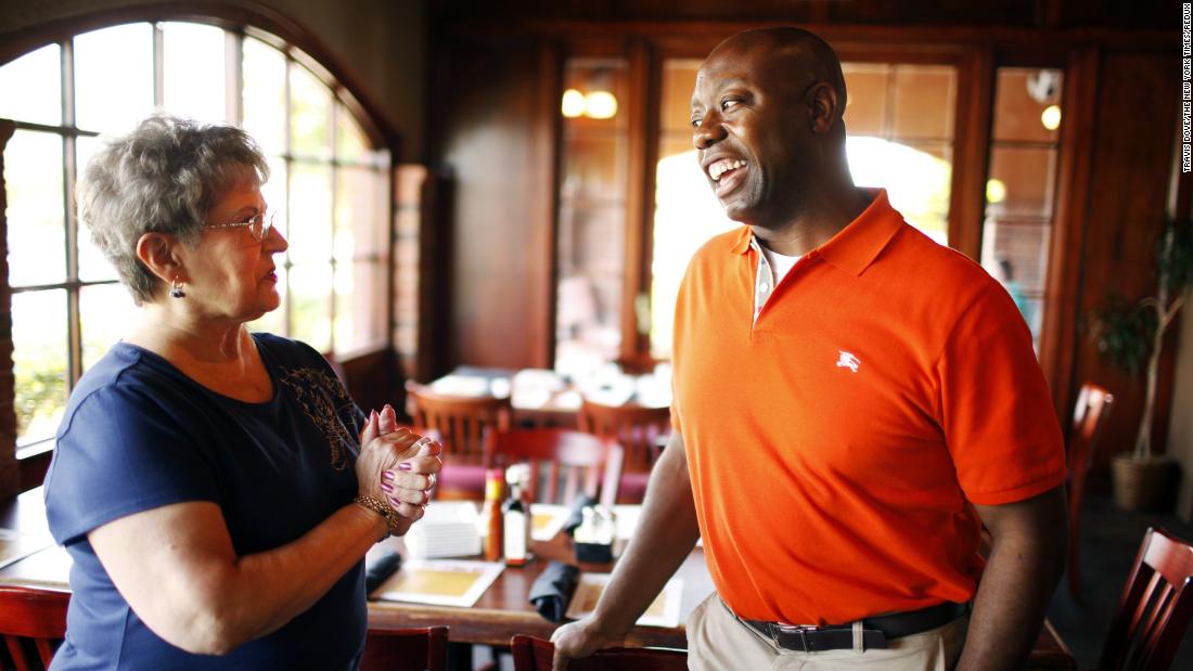 Scott, campaigning for a seat in the US House of Representatives, speaks with supporter Carol Kinsman at a restaurant in Myrtle Beach, South Carolina in June 2010. In 2008, Scott had won a seat in South Carolina&#39;s House of Representatives.