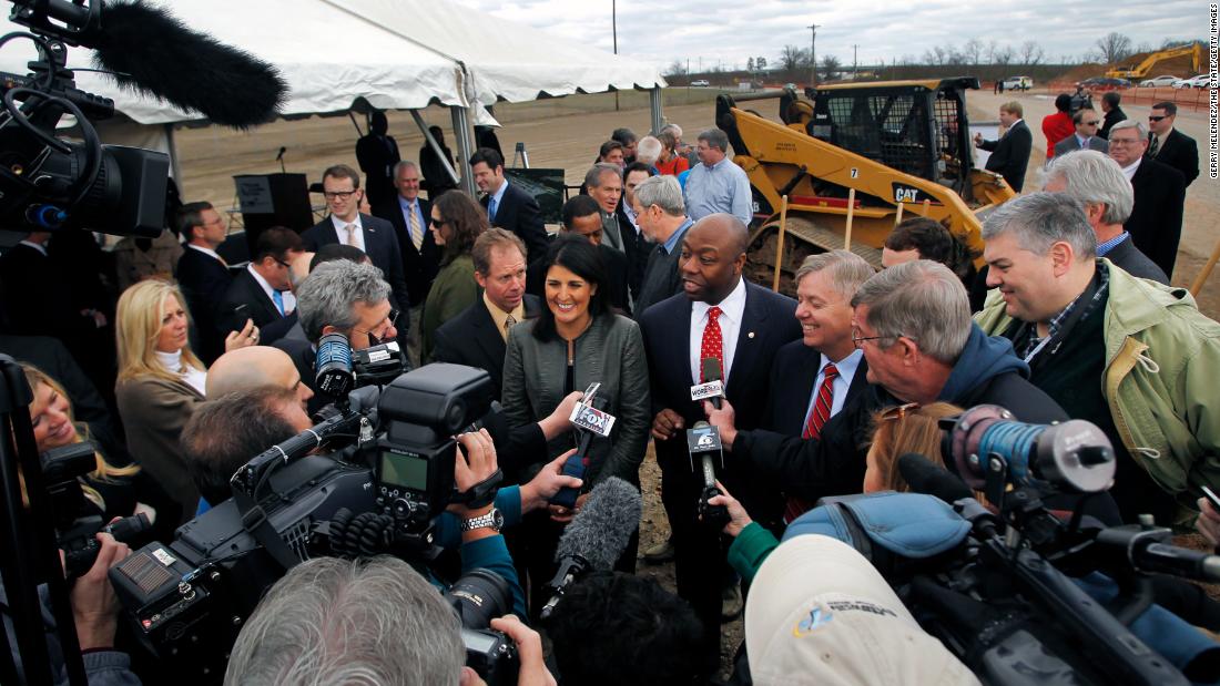 Scott is flanked by Haley and US Sen. Lindsey Graham after a groundbreaking event for the inland port in Greer, South Carolina, in March 2013.