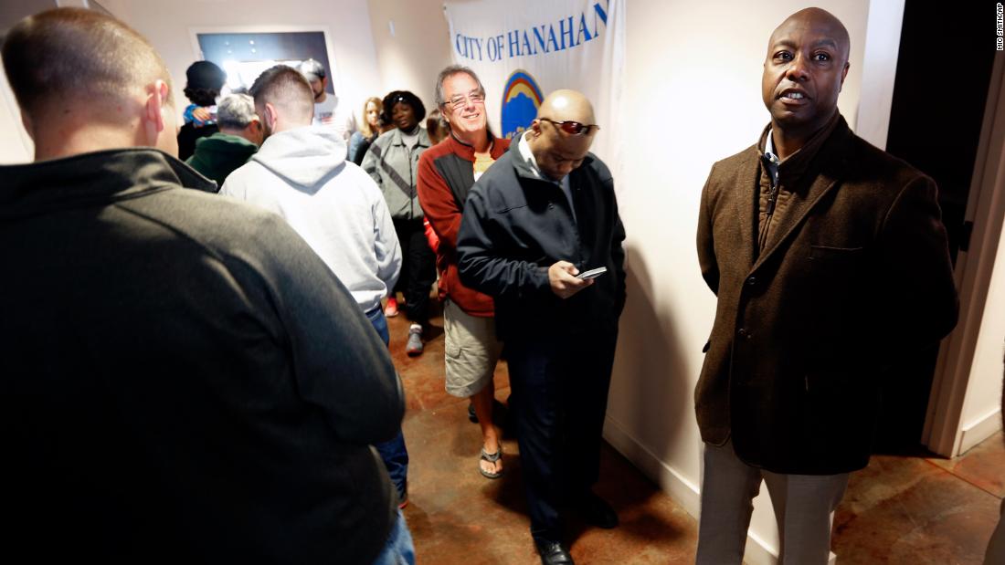 Scott waits in line to vote in Hanahan, South Carolina, in November 2016. He won reelection that year.
