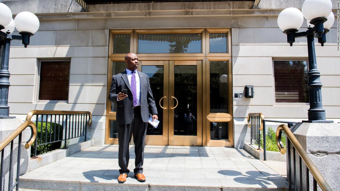 Scott waits for his ride after a Senate Republican Policy luncheon in July 2019.