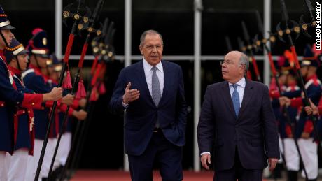Russia&#39;s Foreign Minister Sergey Lavrov, left, talks with Brazilian Foreign Minister Mauro Vieira as he leaves Itamaraty Palace in Brasilia, Brazil, on Monday. 