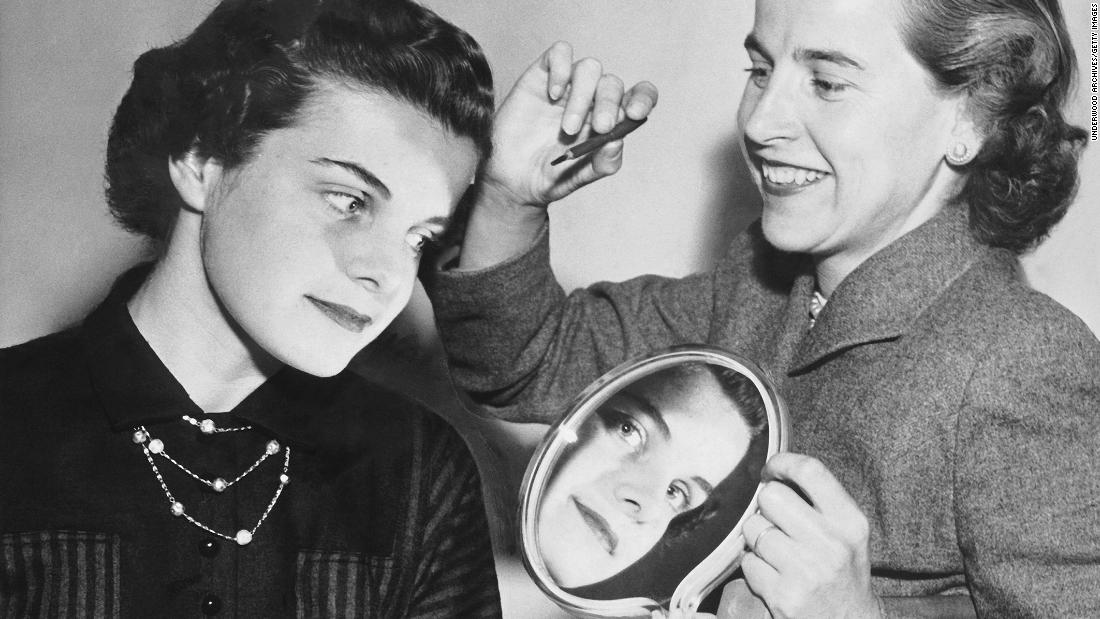 Feinstein gets her makeup touched up for a photo shoot in San Francisco in 1955.