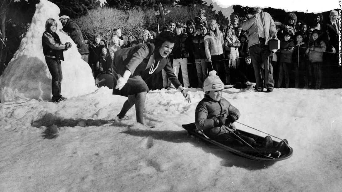 Feinstein pushes a sledder at an event in 1978 where the San Francisco Ice Company spread 17 tons of snow for the annual &quot;Snow-Ball.&quot;