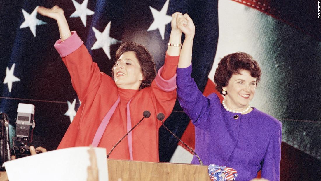 Barbara Boxer and Feinstein raise their arms in victory at an election rally in San Francisco in November 1992. The two women claimed victory over their male Republican rivals.