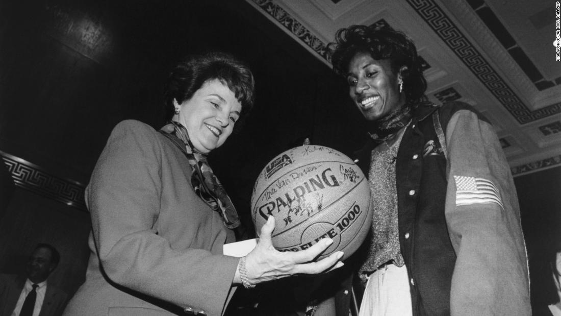 Feinstein is presented with a basketball by Lisa Leslie at a reception honoring the United States women&#39;s national basketball team in 1995.