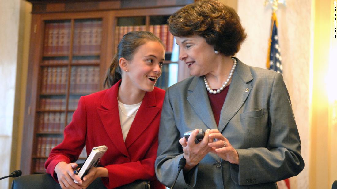 Feinstein talks to her 14-year-old granddaughter, Eileen Mariano, before a Senate Rules and Administration Committee hearing in 2006 on the Fair Elections Now Act, which sought to reform the finance of Senate elections. Mariano was interning in the senator&#39;s office.