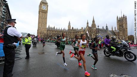 Hassan (center left) passes Big Ben on her way to an unexpected victory in London. 
