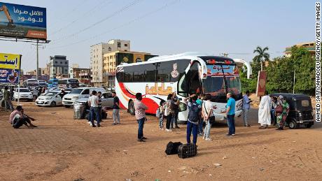 People escaped Khartoum by bus on Tuesday.