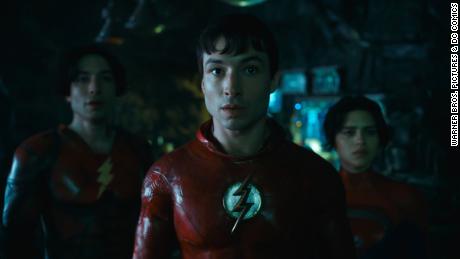 Ezra Miller as Barry Allen/The Flash (left and center), and Sash Calle as Supergirl (right) in the new trailer.