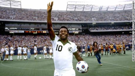 Pelé celebrates during a match for the New York Cosmos in August 1977. 