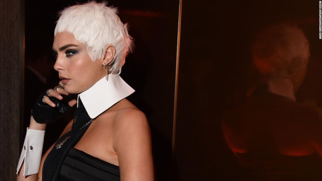 NextImg:Look of the Week: Cara Delevingne as Karl Lagerfeld in a white feather wig