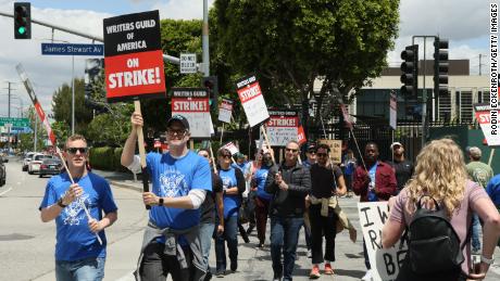 Members of the Writers Guild of America picket outside of Universal Studios on May 3.