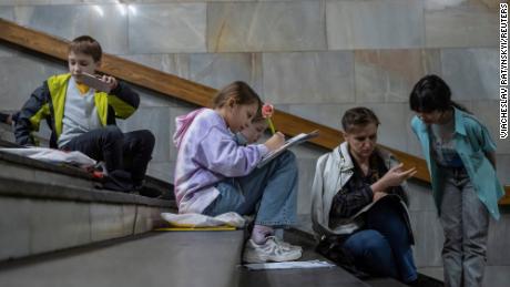 School students attend a lesson as they shelter inside a metro station during an air raid alert, amid Russia&#39;s attack on Ukraine, in Kyiv, Ukraine, on May 3.