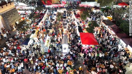 Tourists visit a night market in Liuzhou, a city in the Guangxi Zhuang Autonomous Region on  April 29, 2023. 