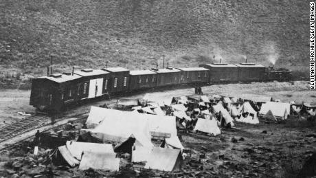 Chinese immigrants played a vital role in building the Transcontinental Railroad. This file photo shows a campsite in Nevada where workers lived.