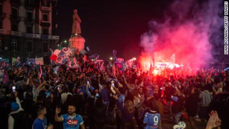 Fans in Naples celebrate Napoli&#39;s first league title in 33 years. 