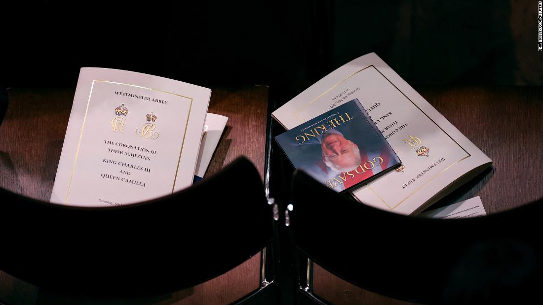 Order-of-service booklets are seen at Westminster Abbey as guests arrive for the coronation.