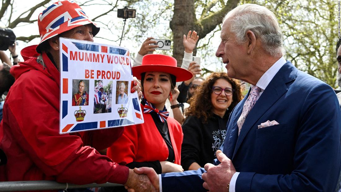 The King meets well-wishers outside Buckingham Palace during a walkabout on Friday.