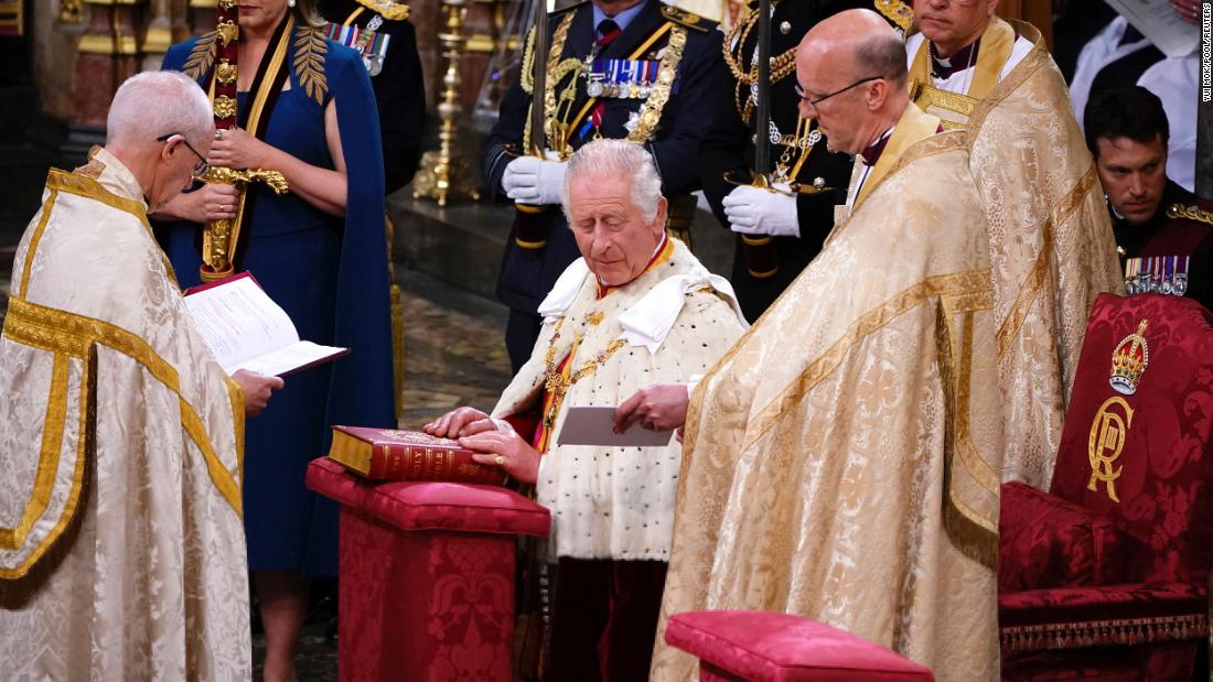 The King places his hands on the Coronation Bible as he &lt;a href=&quot;https://www.cnn.com/uk/live-news/king-charles-iii-coronation-ckc-intl-gbr/h_329d6fba5cd3c92110395f5152360553&quot; target=&quot;_blank&quot;&gt;takes the Coronation Oath&lt;/a&gt;.