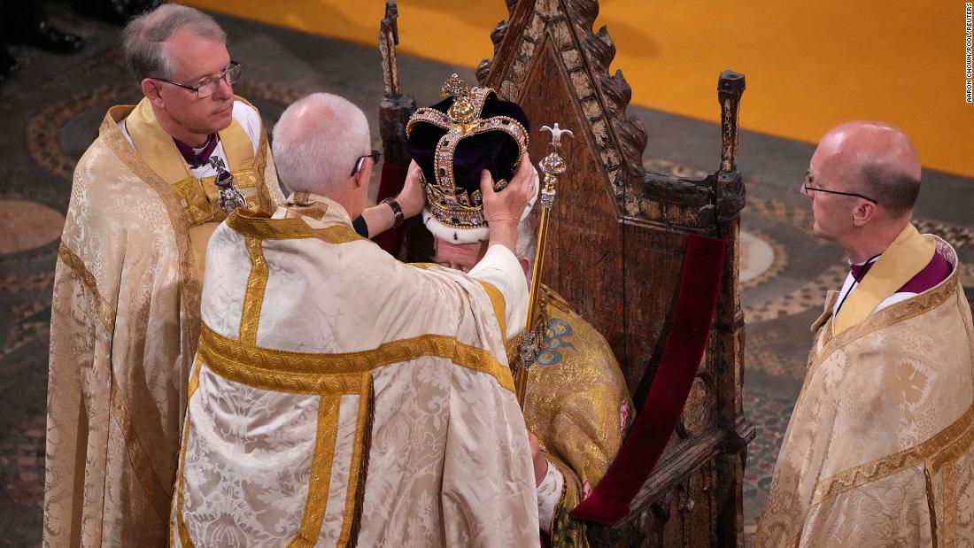 The Archbishop of Canterbury Justin Welby &lt;a href=&quot;https://www.cnn.com/uk/live-news/king-charles-iii-coronation-ckc-intl-gbr/h_0a26f9200f7038d529cbcb8cb39e0871&quot; target=&quot;_blank&quot;&gt;places the St. Edward&#39;s Crown onto the head of the King&lt;/a&gt;.