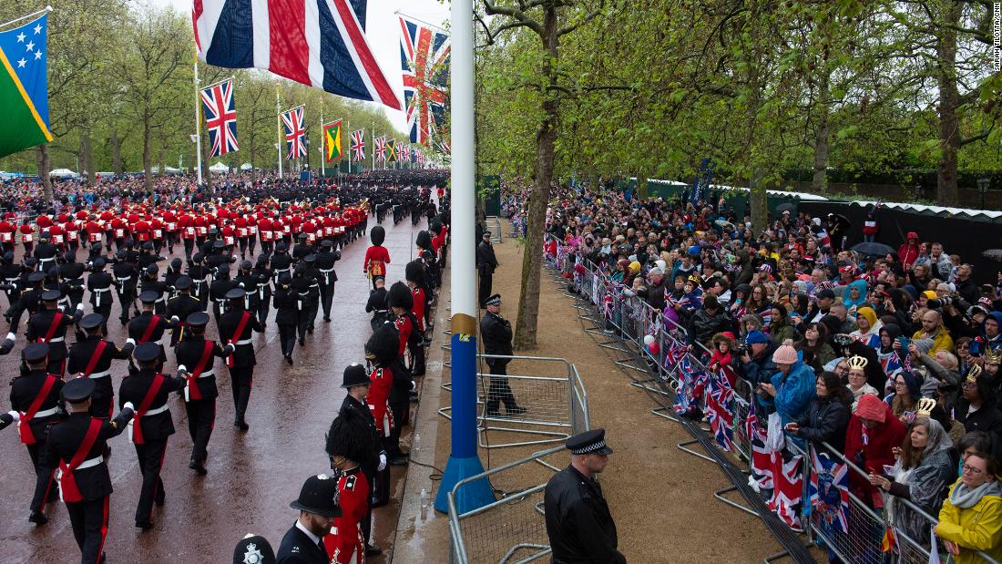 Military groups take part in the parade from Westminster Abbey to Buckingham Palace.