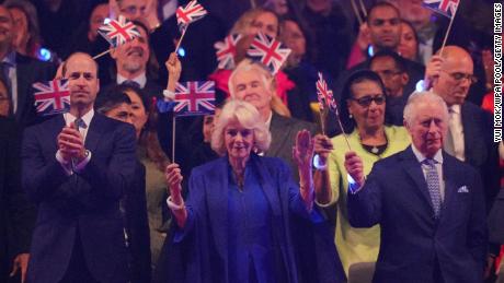 Prince William, Prince of Wales (left); Queen Camilla and King Charles III (right) at the Coronation Concert on Sunday.