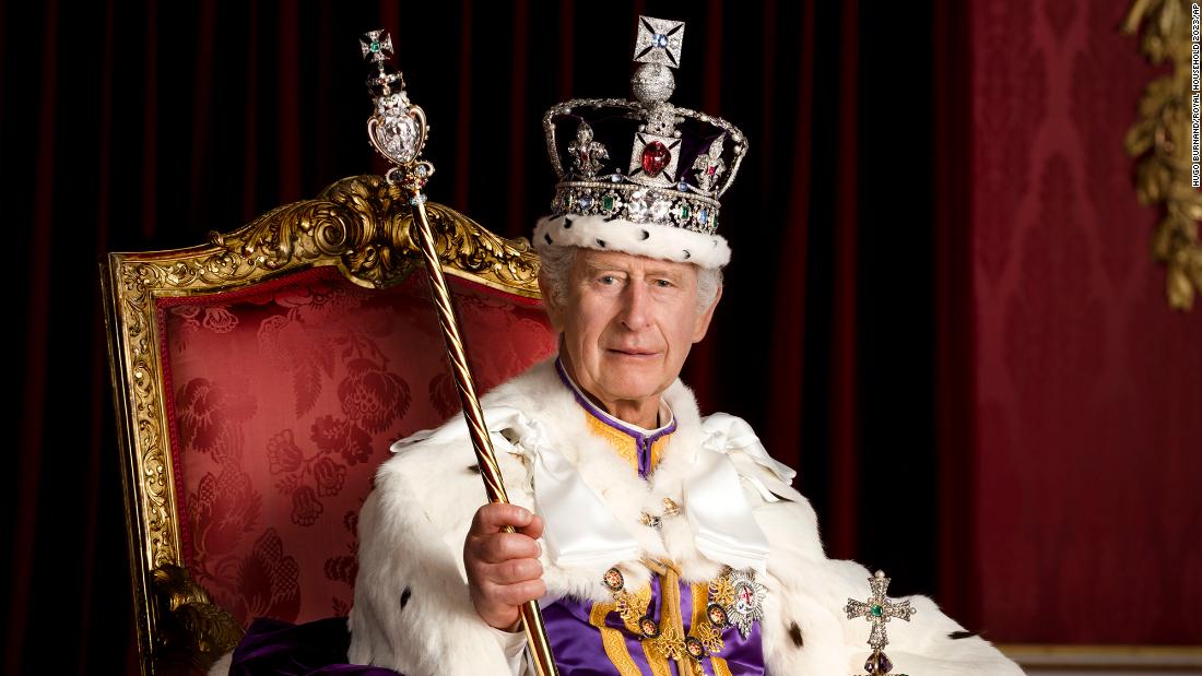 Britain&#39;s King Charles III &lt;a href=&quot;https://www.cnn.com/2023/05/08/uk/coronation-official-portraits-intl-gbr-ckc/index.html&quot; target=&quot;_blank&quot;&gt;poses for a portrait&lt;/a&gt; in Buckingham Palace&#39;s Throne Room dressed in full regalia. He is wearing the Robe of Estate and the Imperial State Crown while holding the Sovereign&#39;s Orb and the Sovereign&#39;s Sceptre with Cross.