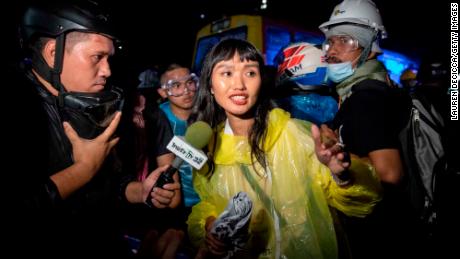 Protest leader, Chonthicha Jangrew, speaks to media as pro-democracy protesters and student activists march to The Grand Palace on November 8, 2020 in Bangkok, Thailand.  