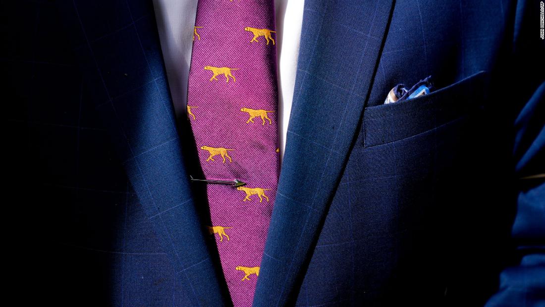 A handler wears a dog-themed tie on Monday. 