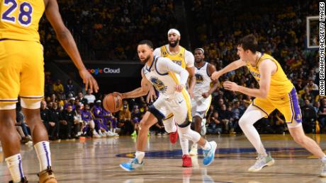 Curry dribbles the ball during Game 5 