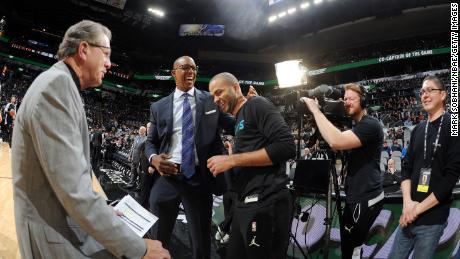 Tony Parker #9 of the Charlotte Hornets greets Sean Elliott prior to the game on January 14, 2019 at the AT&amp;T Center in San Antonio, Texas.