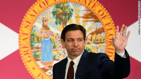 Florida Governor Ron DeSantis waves as he leaves after signing several bills related to public education and teacher pay, at a press conference in Miami, Tuesday, May 9, 2023. 