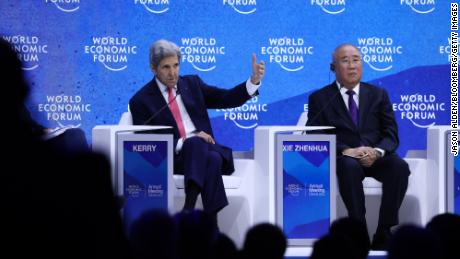 Kerry and Xie Zhenhua, left, China&#39;s special envoy for climate change, during a panel discussion at the World Economic Forum in Davos in 2022.