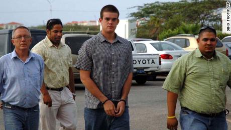 Joran van der Sloot, center, arrives for DNA testing on July 20, 2005, in Oranjestad, Aruba.