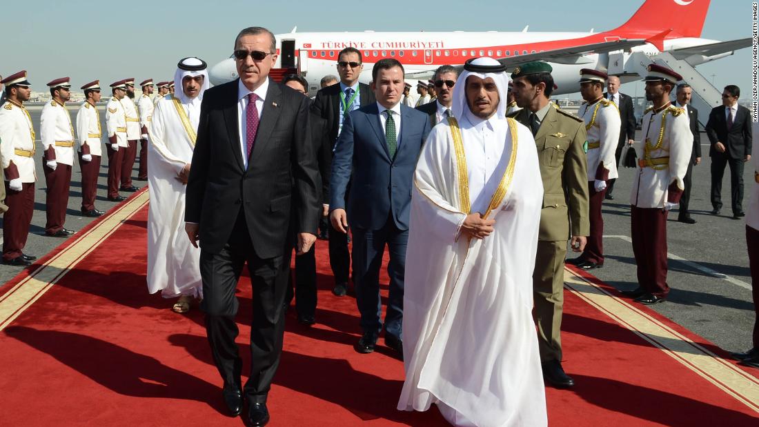 Erdogan is welcomed to Qatar by Prime Minister Abdullah bin Nasser bin Khalifa Al Thani in 2013.