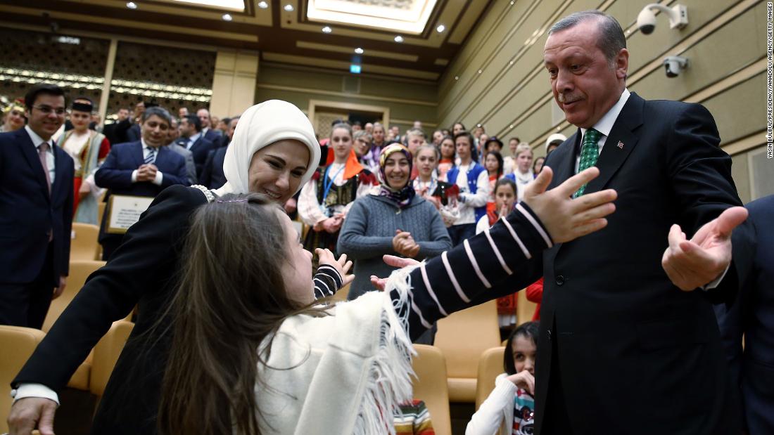 Erdogan greets a child at the Presidential Palace as part of a children&#39;s festival in Ankara in April 2015.