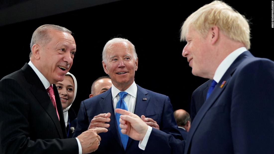 Erdogan talks with US President Joe Biden, center, and British Prime Minister Boris Johnson, right, at a NATO summit in Madrid in June 2022.