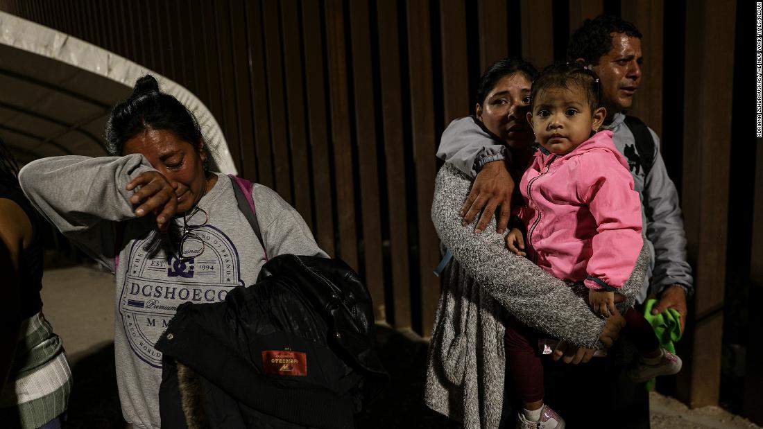 Migrants from Peru react after crossing the border in Yuma, Arizona, just a few minutes before the lifting of Title 42 on May 11.