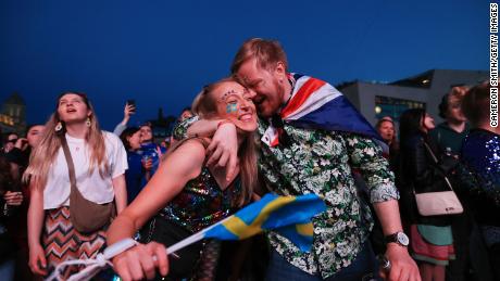 Eurovision fans enjoy the party atmosphere as they gather in Liverpool to watch the Eurovision Song Contest final.