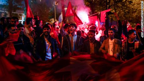Supporters of Turkish President Recep Tayyip Erdogan celebrate at the AK Party headquarters on May 14, 2023 in Istanbul, Turkey. Photo by Jeff J Mitchell/Getty Images.